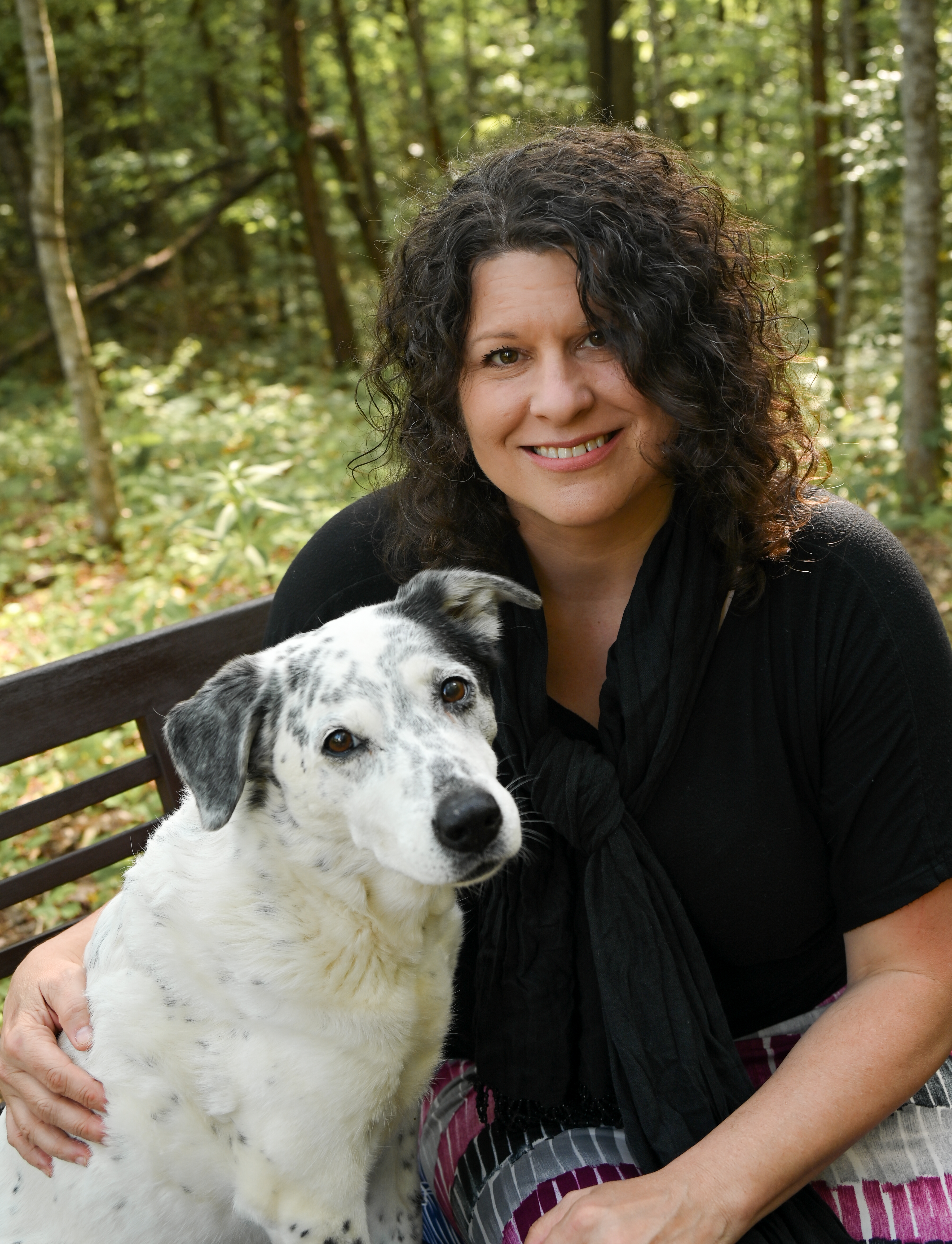 Woman poses with dog