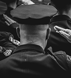 Law enforcement officers saluting