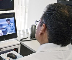 Clinician conducting a telemedicine forensic exam