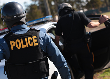 Officer at scene in tactical vest