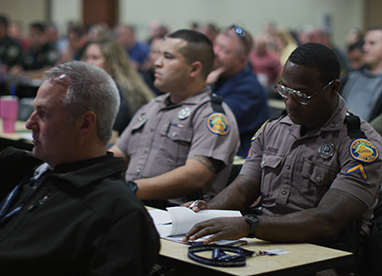 Officers working at a table