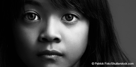 Black and white image of young girl's face