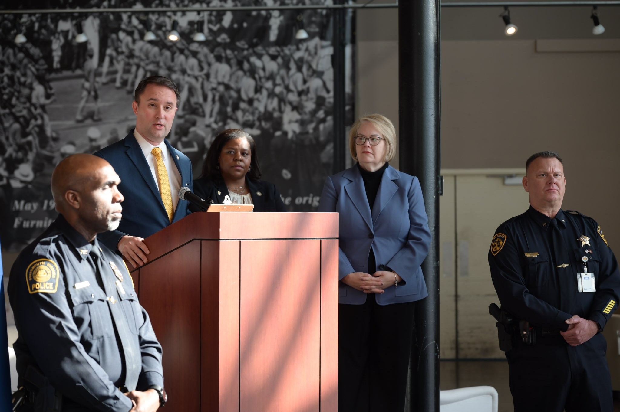 Attorney General Jason Miyares, Robin Gauthier, Executive Director of Samaritan House, presenting at a Press Conference for 100% BATT (Businesses Alliance Against Trafficking)