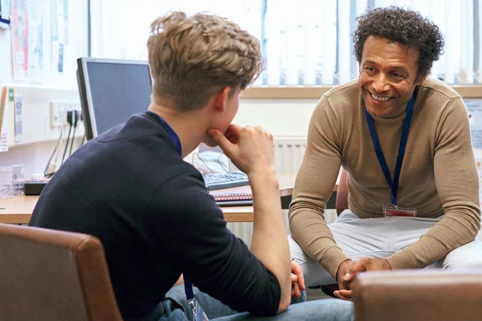 Counselor and male adolescent