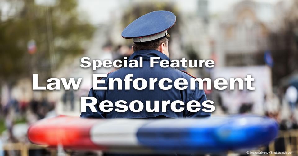 Image of Police Officer behind Patrol Car Special Feature: Law Enforcement Resources text