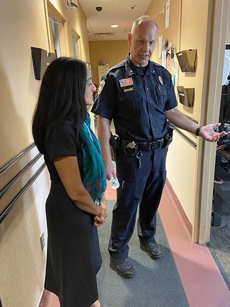 Associate Attorney General Gupta with Police Chief James West