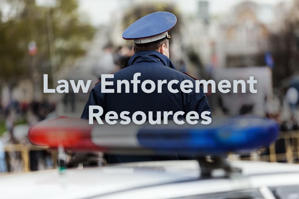 Law Enforcement Resources on background of police officer and vehicle
